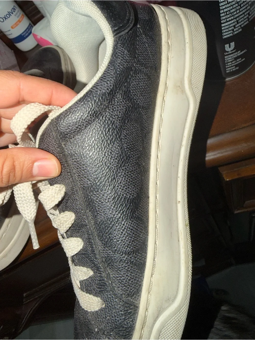 Coach Black Leather Low-Top Sneakers with Cream Soles and Laces